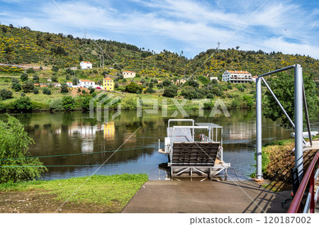 Walking along the Barca da Amieira walkways in Amieira do Tejo, Portugal. 120187002