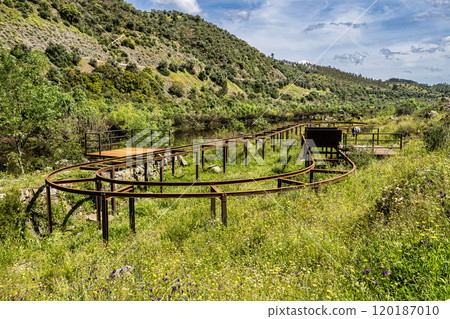 Walking along the Barca da Amieira walkways in Amieira do Tejo, Portugal. 120187010
