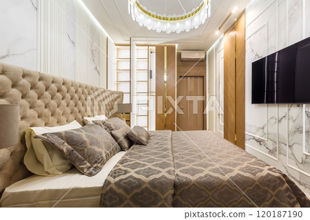 Luxury Interior Primary Bedroom Detail of Headboard and Bedding. Luxury Interior Primary Bedroom Detail of Headboard and Bedding. 120187190