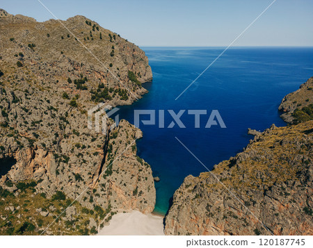 Breathtaking aerial view of a rocky coastline with cliffs  120187745