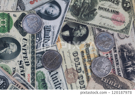 Old west US banknotes and silver certificates with silver dollar coins Old west US banknotes and silver certificates with silver dollar coins 120187978