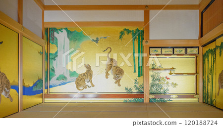 A gorgeous Japanese-style room with a painting of a leopard and tiger in a bamboo forest 120188724