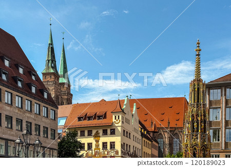 Schoner Brunnen ancient fountain and Frauenkirche Church at Hauptmarkt main square 120189023
