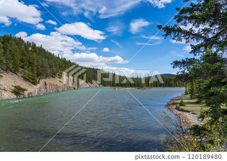 Canadian Rockies Jasper National Park landscape background. Athabasca River in summer. Alberta, Canada. 120189480