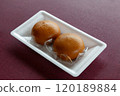 Hot spring buns served on a tray 120189884