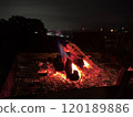 Quietly burning bonfire 120189886