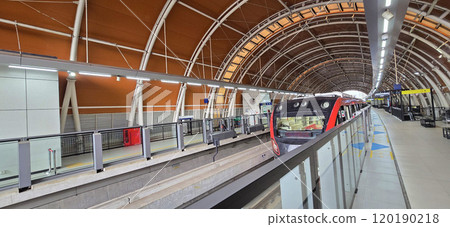 Light Rail Transit or LRT or rail transport system in Indonesia, modern metro train stationed at an urban platform, showcasing efficient public transport 120190218