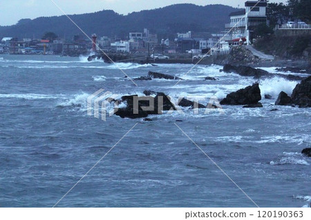 Image of waves crashing on the beach at Imrang, Korea Image of waves crashing on the beach at Imrang, Korea 120190363