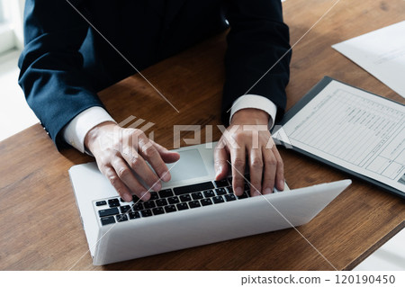 Recruiter checking application documents 120190450