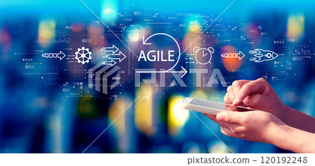 Agile concept with person using a smartphone at night 120192248