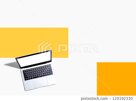 Laptop computer with shadow from above 120192330