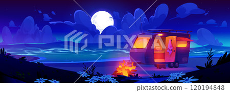Camper van trailer with fire on sea beach at night 120194848