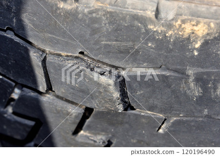 Worn tires, slip signs, cracked and burst tires 120196490