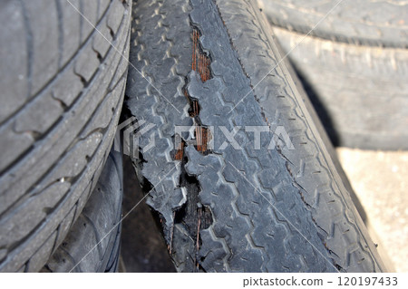 Worn tires, slip signs, cracked and burst tires Worn tires, slip signs, cracked and burst tires 120197433