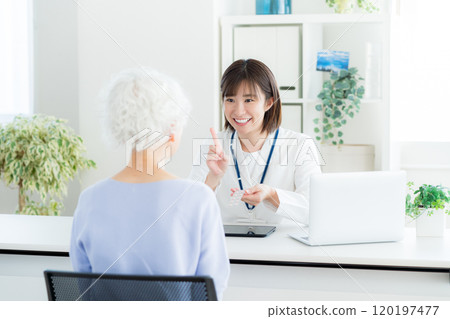 Pharmacist giving medicine to senior Pharmacist giving medicine to senior 120197477