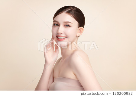 Beautiful young asian woman with clean fresh skin on beige background, Face care, Facial treatment, Cosmetology, beauty and spa, Asian women portrait. 120200982