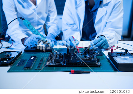 Close up of Technician measuring voltage electronic circuit board, Service after sale fix electric equipment. 120201083