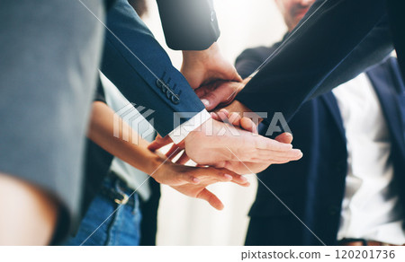 Nothing carries a team to success like a solid connection. Cropped shot of a group of businesspeople joining their hands in solidarity. Nothing carries a team to success like a solid connection. Cropped shot of a group of businesspeople joining their hands in solidarity. 120201736