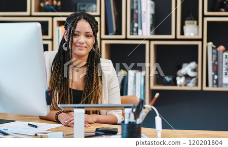 Its time to get my business up and running. Cropped portrait of an attractive young woman sitting in her home office. Its time to get my business up and running. Cropped portrait of an attractive young woman sitting in her home office. 120201804