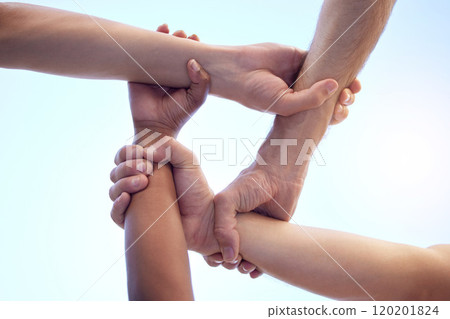 No discrimination between our team. Shot of a group of diverse people with their arms interlinked. 120201824
