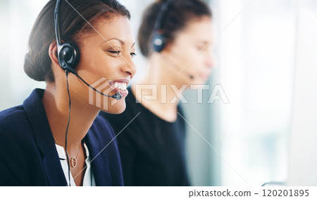 Use your voice to give customers a voice. Shot of a young woman using a headset and computer in a modern office. 120201895