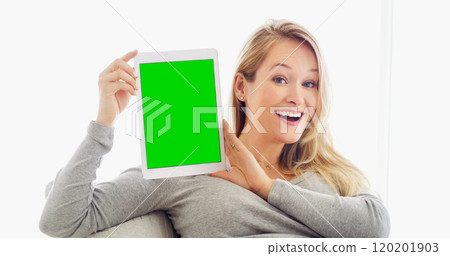 When in doubt, dont shout. Look here. Shot of an attractive young woman holding up a tablet in at home. 120201903