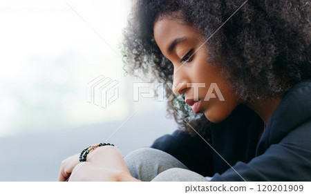 Dont allow self doubt to overpower your strength. Shot of a young woman suffering from depression. Dont allow self doubt to overpower your strength. Shot of a young woman suffering from depression. 120201909