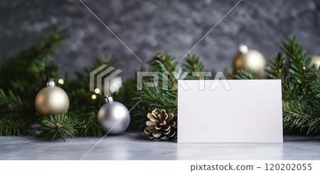 Christmas greeting card mockup with pine branches and ornaments for holiday design 120202055