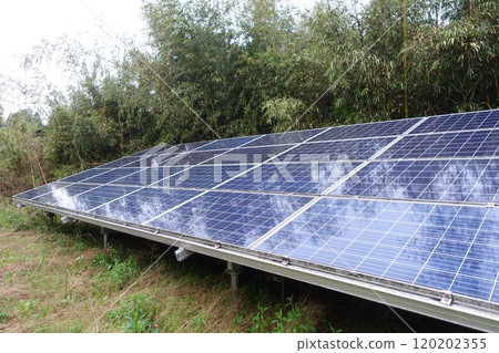 Solar panels wet with rain Solar power plant in the rain Solar panels wet with rain Solar power plant in the rain 120202355