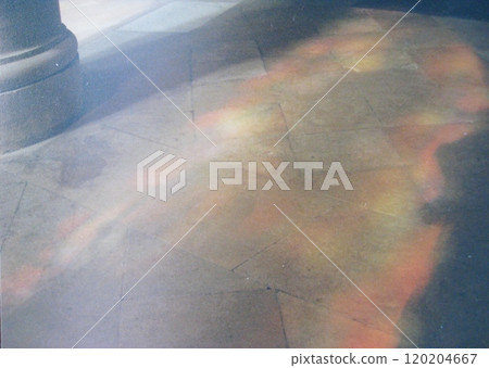 Stained glass light reflecting off the church floor Stained glass light reflecting off the church floor 120204667