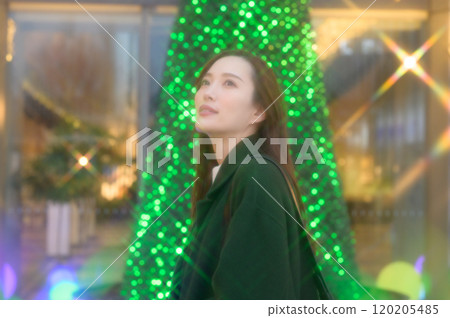 A woman enjoying winter illuminations A woman enjoying winter illuminations 120205485
