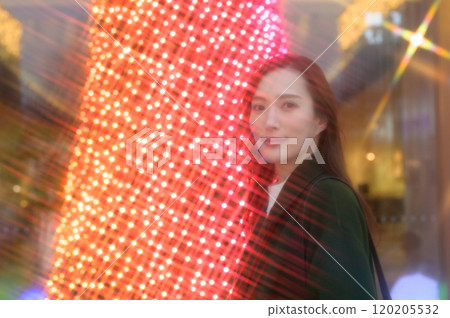 A woman enjoying winter illuminations A woman enjoying winter illuminations 120205532