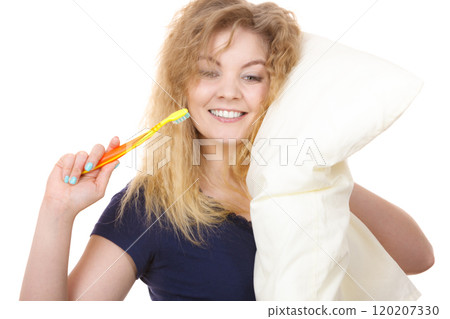Sleepy happy woman hugging white pillow 120207330