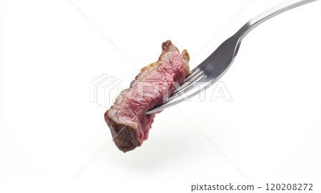 Juicy slice of steak on a fork 120208272