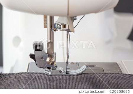 Sewing machine, stitching fabrics, needle in a round plan 120208655