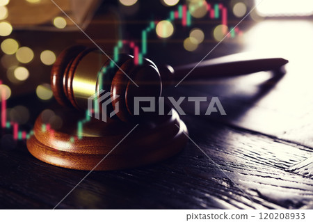Wooden judge gavel and legal book on wooden table 120208933