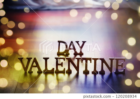 The word "Valentine's Day". Love on wooden blocks. Theme of love. Wooden letter blocks. Loving, positive emotions. Wooden letters with the word. An exclusive relationship. The word "Valentine's Day". Love on wooden blocks. Theme of love. Wooden letter blocks. Loving, positive emotions. Wooden letters with the word. An exclusive relationship. 120208934