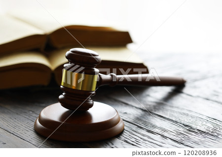 Judges gavel on wooden desk. Law firm concept. 120208936