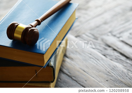 Judges gavel on wooden desk. Law firm concept. 120208938
