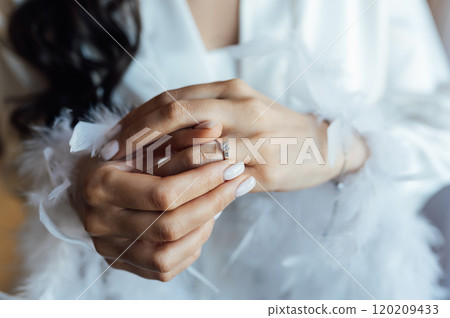 A tender bride strokes her body with her hands and sensually touches her skin. Sensual moment A tender bride strokes her body with her hands and sensually touches her skin. Sensual moment 120209433