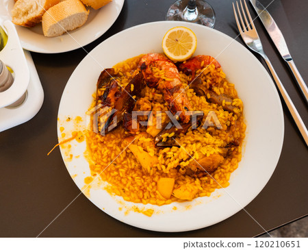 Paella with meat, chicken and seafood 120210651