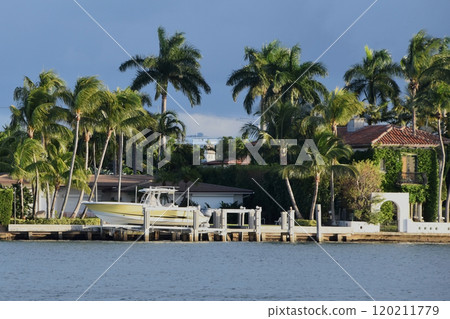Luxury houses at the canal in Miami Beach. Elegant waterfront mansions line the picturesque canals of Miami Beach 120211779