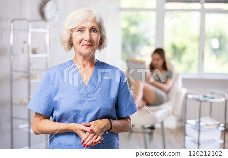 Elderly female doctor portrait Elderly female doctor portrait 120212102