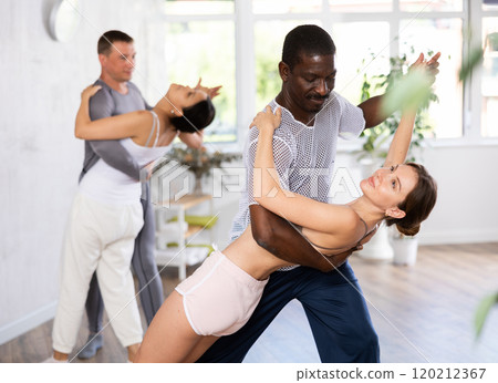 Adult man and young woman dancing pair dance 120212367