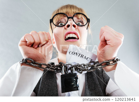 Furious woman with chained hands and contract Furious woman with chained hands and contract 120213641