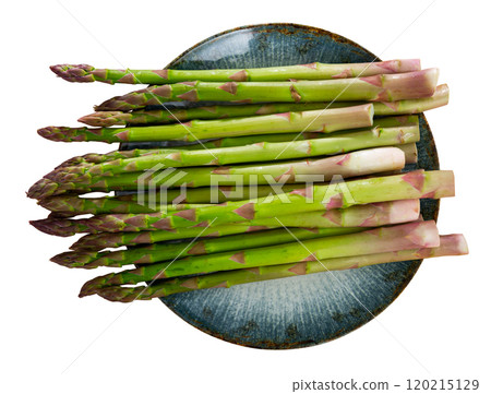 Plate of fresh raw green asparagus with knife on table Plate of fresh raw green asparagus with knife on table 120215129