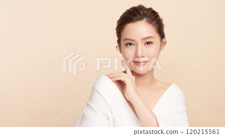 Beautiful young asian woman with clean fresh skin on beige background, Face care, Facial treatment, Cosmetology, beauty and spa, Asian women portrait. 120215561
