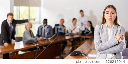 Portrait of sad young woman secretary Portrait of sad young woman secretary 120216944
