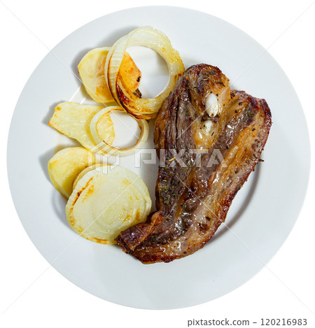 Delicious beef steak with fried onions on dining table Delicious beef steak with fried onions on dining table 120216983