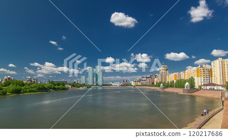 Yesil river timelapse hyperlapse with modern towers of residential complex in Astana 120217686